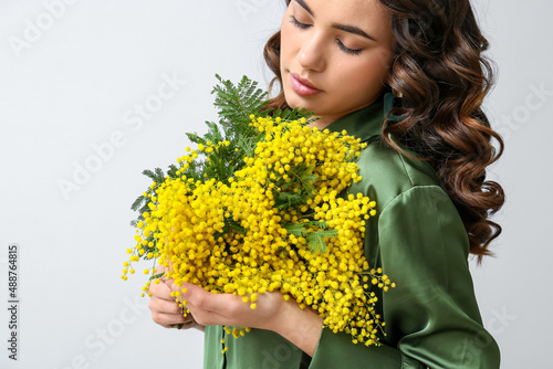 Beautiful young woman with ...