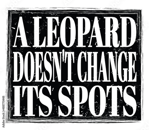 A LEOPARD DOESN T CHANGE ITS SPOTS  text on black stamp sign