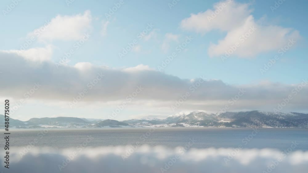 Picturesque Landscape Of Mountain And Sea At Winter In Norway. - slow motion Picturesque Landscape Of Mountain And Sea At Winter In Norway. - slow motion