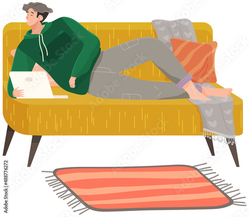 Man lying on couch with computer, holding laptop and correspondence surfing in Internet. Male character communicating with friends, studying remotely, sitting on sofa, relaxing, resting after work