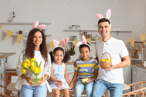 Happy family in kitchen on ...