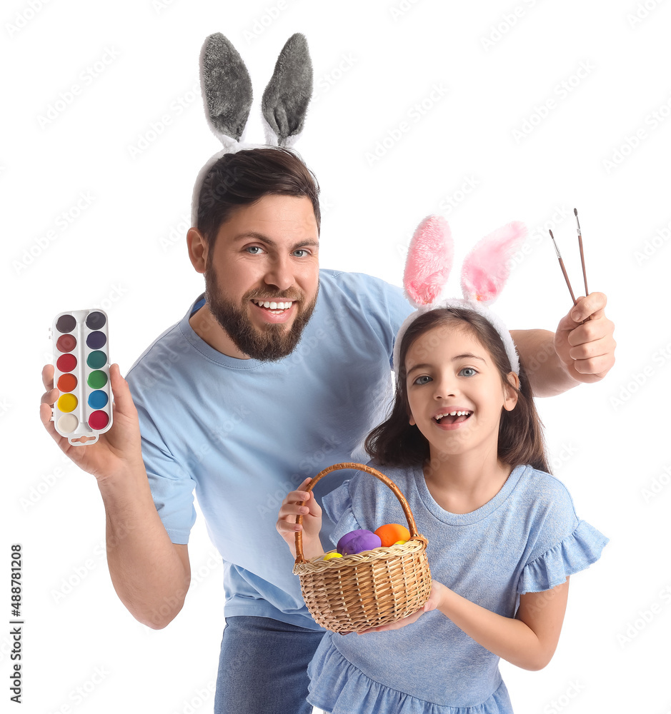 Little girl with Easter eggs, her father and paints on white background Little girl with Easter eggs, her father and paints on white background