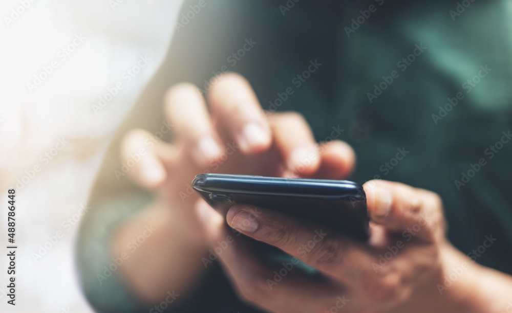 person typing on a mobile person typing on a mobile