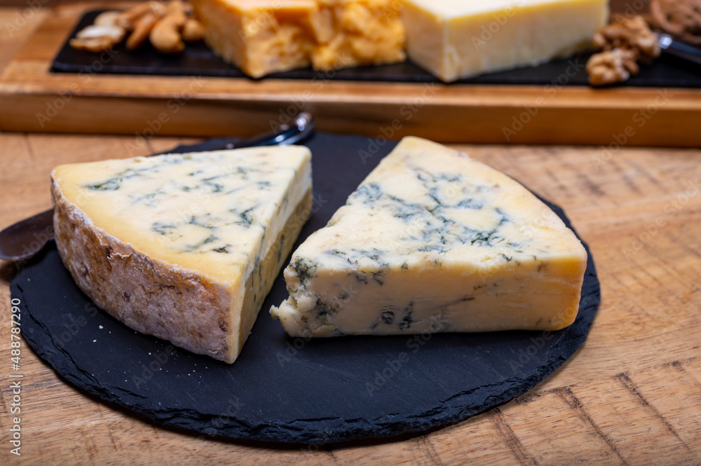 British cheeses collection, blue Stilton, Scottish coloured and English matured cheddar cheeses British cheeses collection, blue Stilton, Scottish coloured and English matured cheddar cheeses
