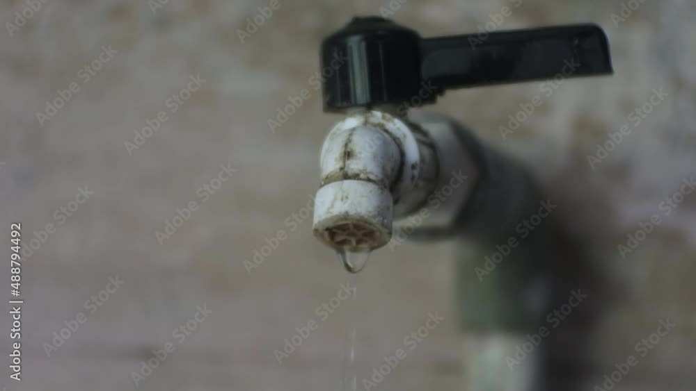 water comes out of a bucket in a faucet, water flows on a small scale, water is the source of living creatures water comes out of a bucket in a faucet, water flows on a small scale, water is the source of living creatures