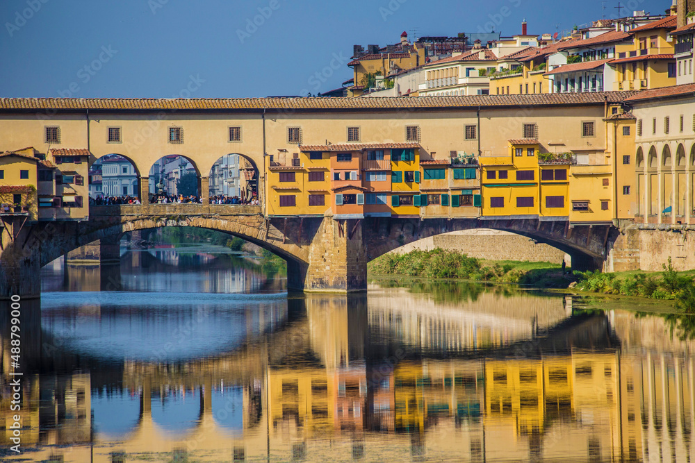 view of bridge  Ponte Vecchio in Florence, old stone bridge, photo taken from Michelangelo Square, Italy