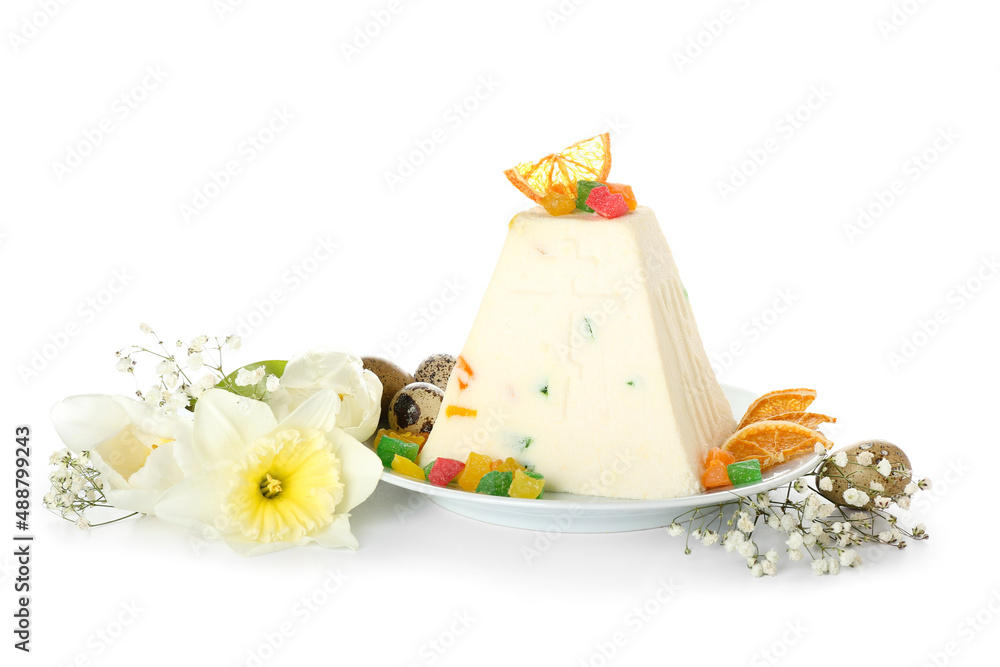Plate with tasty curd Easter cake, candied fruits and flowers on white background Plate with tasty curd Easter cake, candied fruits and flowers on white background