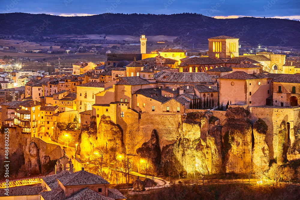 Obraz premium Illuminated picturesque city of Cuenca at dusk. Travel Spain