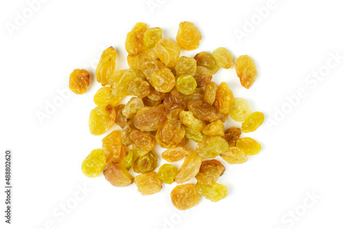 A handful of raisins on a white isolated background.