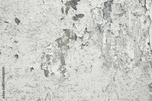 Cracked wall background. Cement white texture cracks