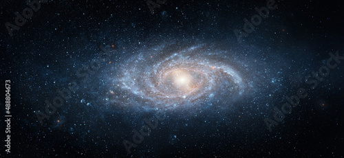 Fototapeta Naklejka Na Ścianę i Meble -  View from space to a spiral galaxy and stars. Universe filled with stars, nebula and galaxy,. Elements of this image furnished by NASA.