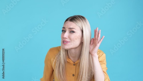 Wallpaper Mural Lady not hear difficulty secret disappointed isolated blue color background Torontodigital.ca