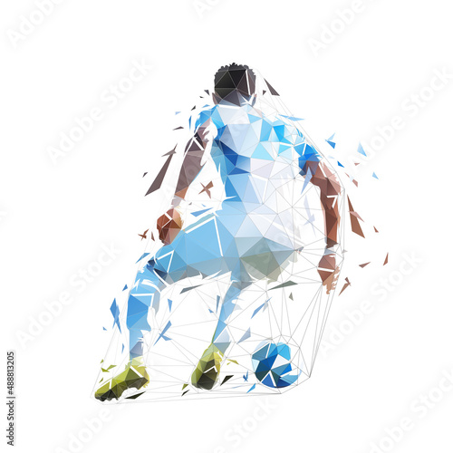 Soccer player with ball, isolated low polygonal vector illustration, rear view