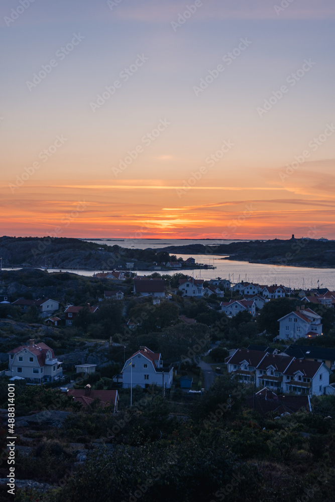 sunset over the village in goteborg, sweden