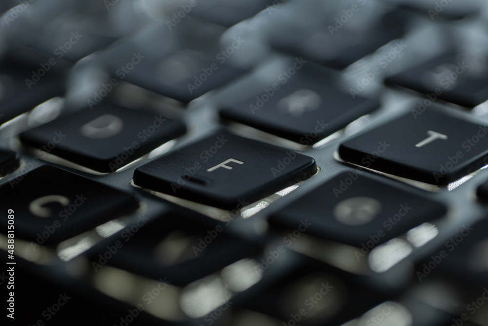 Modern computer keyboard with f button, close-up. Press f concept Modern computer keyboard with f button, close-up. Press f concept