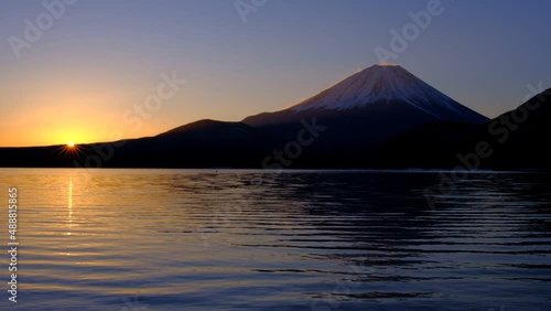 Sunrise and Mt. Fuji from Lake Motosu  Japan 02/22/2022 photo