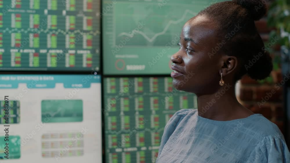Financial analyst using stock market statistics to plan profit strategy, working with laptop and multi monitors. Financial investment share with forex trade exchange sales and numbers. Close up Financial analyst using stock market statistics to plan profit strategy, working with laptop and multi monitors. Financial investment share with forex trade exchange sales and numbers. Close up