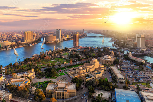 Fotografiet Aerial view on the downtown of Cairo and the Nile at sunset, Egypt