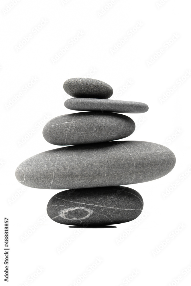 Pyramid of the balanced grey stones isolated on white background. Pyramid of the balanced grey stones isolated on white background.