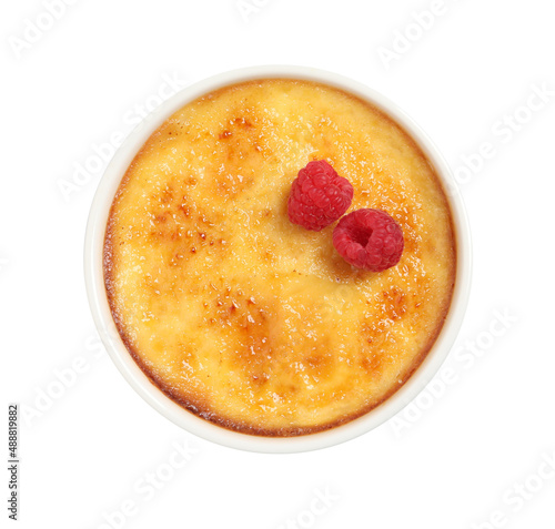 Delicious creme brulee with fresh raspberries isolated on white, top view