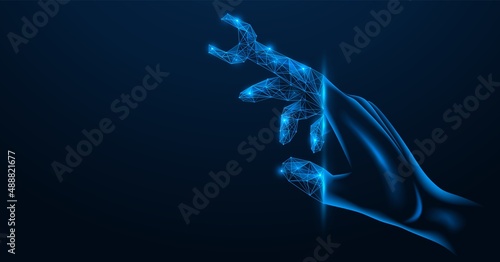 A wrench on the finger of the hand. A tool for setting up digital mechanisms. Polygonal design. Blue background.