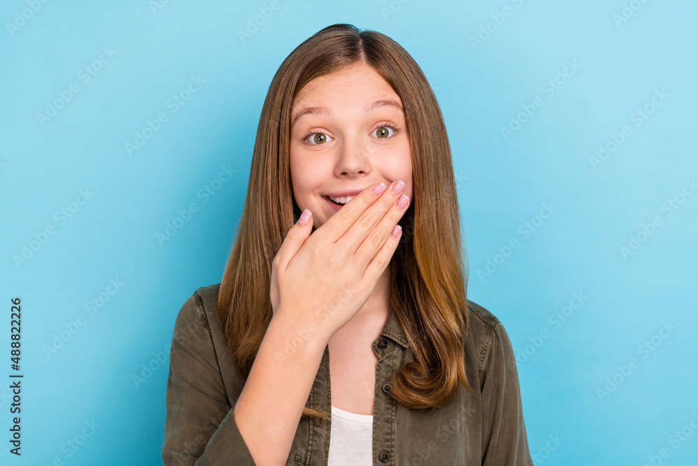 Portrait of good mood cheerful excited little lady laughing having fun hear joke isolated on blue color background Portrait of good mood cheerful excited little lady laughing having fun hear joke isolated on blue color background