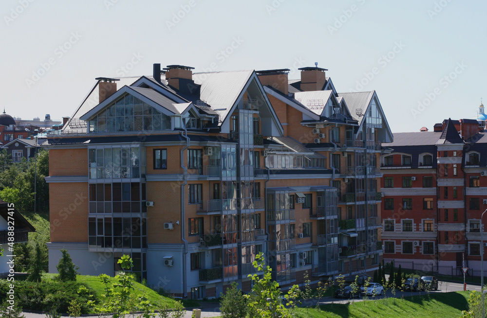 Residential buildings on the Kremlin embankment on the banks of the Kazanka River, Kazan, Republic of Tatarstan, Russia - july 21 2021 Residential buildings on the Kremlin embankment on the banks of the Kazanka River, Kazan, Republic of Tatarstan, Russia - july 21 2021