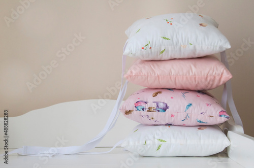 Fototapeta Naklejka Na Ścianę i Meble -  Baby pillows in the bed