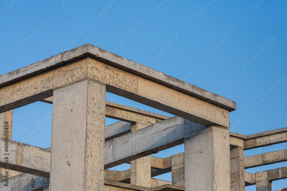 Close-up of the construction of a stone building. Construction of a new building in formwork