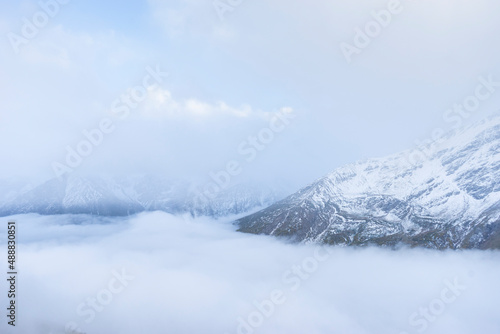 Fog and clouds on mountain. High mountain in mist and cloud