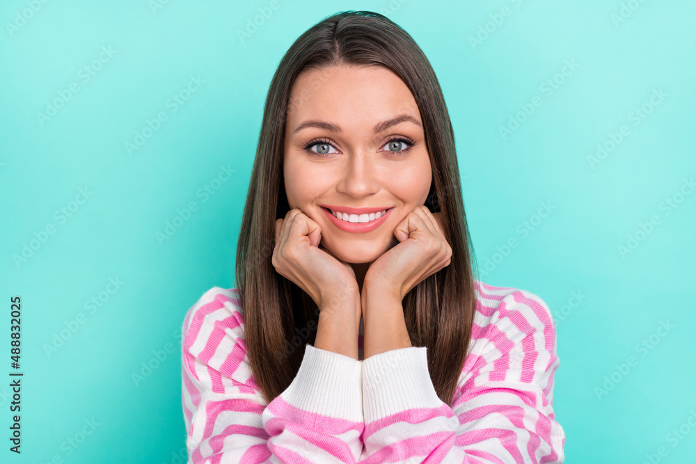 Portrait of attractive cheerful cute sweet girl resting good mood isolated over bright teal turquoise color background Portrait of attractive cheerful cute sweet girl resting good mood isolated over bright teal turquoise color background