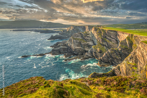 Fotografie, Tablou Cloudy sunset at Kerry Cliffs in Portmagee Ring of Kerry Ireland Wild Atlantic W