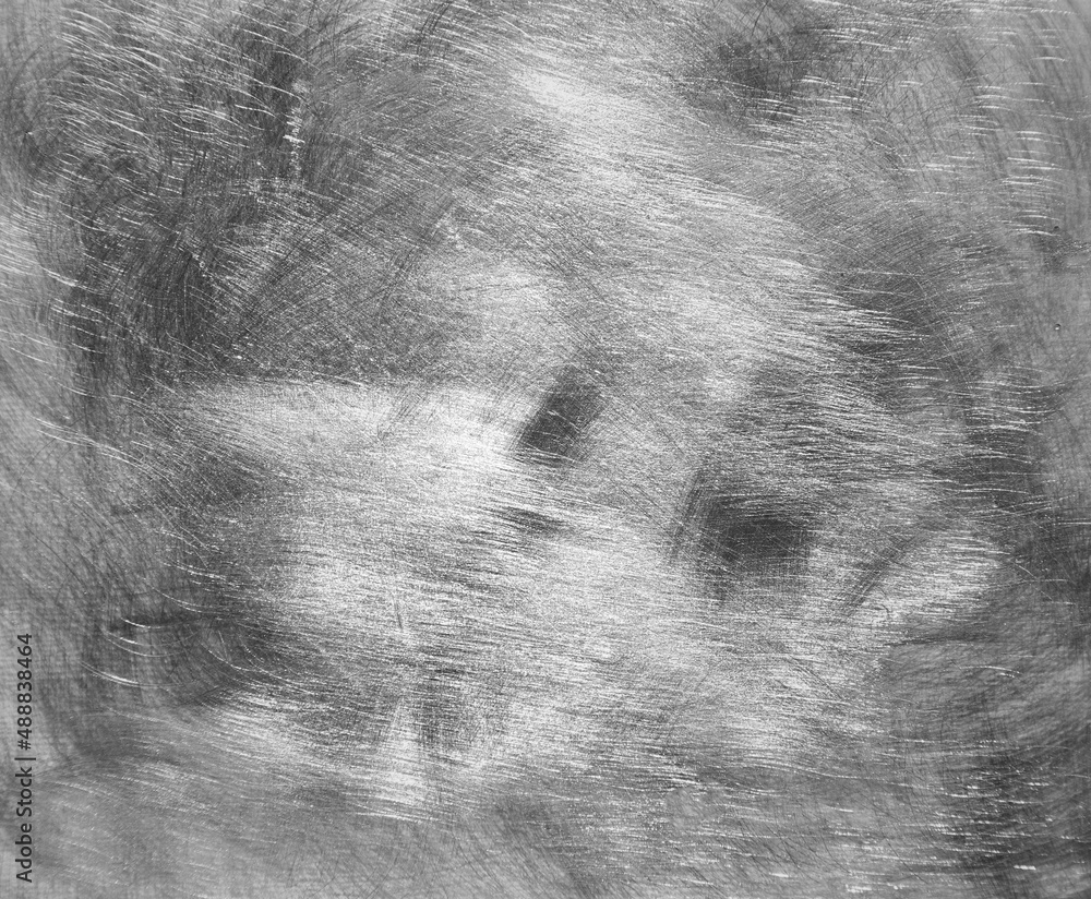 Scratched grey metal texture background Scratched grey metal texture background