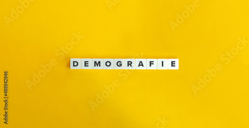 Demografie Word on Letter Tiles on Yellow Background. Minimal Aesthetics.