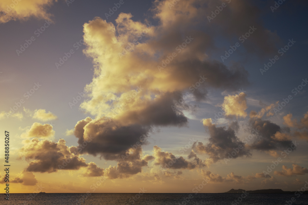 Clouds over the sea at sunset light.