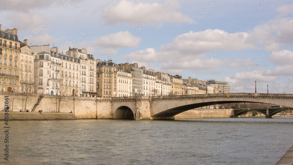 View of Île Saint-Louis and Pont de la Tournelle over the Seine in Paris, France