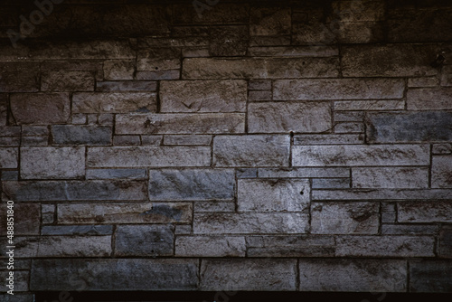 A stone wall on the outside of a local pizzeria in Orwell, Ohio