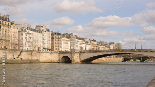 View of Île Saint-Louis and Pont de la Tournelle over the Seine in Paris, France