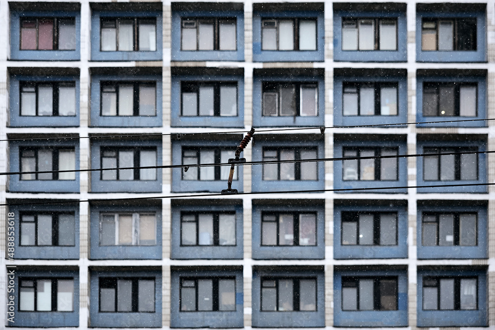 trolleybus wires against the background of windows trolleybus wires against the background of windows