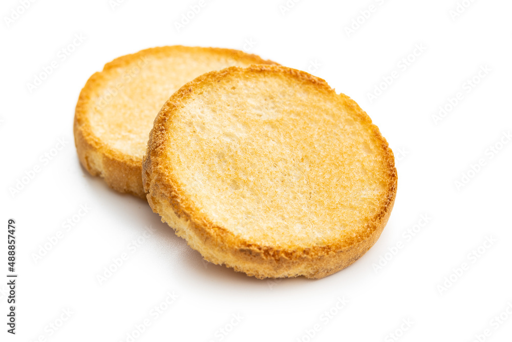 Dietary rusks bread. Crusty biscuits isolated on white background.