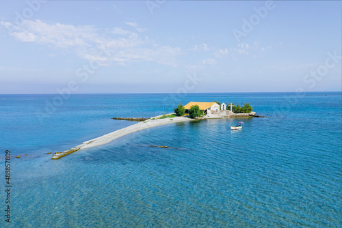 Fototapeta Naklejka Na Ścianę i Meble -  Aerial view of the sandbank with Orthodox Church near island of Lefkada, summer Greece