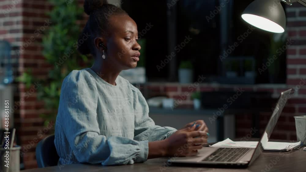 Investor attending remote videocall meeting to talk about investment share on laptop, online teleconference about exchange market sales. Remote communication about hedge fund money. Investor attending remote videocall meeting to talk about investment share on laptop, online teleconference about exchange market sales. Remote communication about hedge fund money.