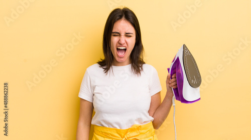 Photo young hispanic woman shouting aggressively, looking very angry