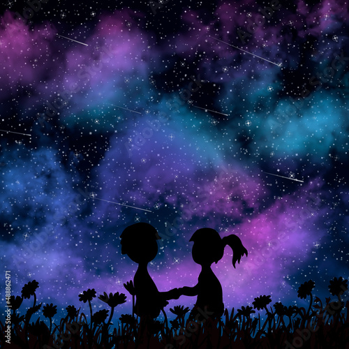 Boy and girl are standing together and holding their hands at the night under the starfall. The time when all dreams and wishes come true. Romantic valentine image with stars, meteors, nebula.