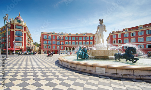 France, Nice, Fountain of the Sun, Place Massena in center of Nice, Plassa Carlou Aubert, tourism, sunny day, blue sky, square tiles laid out in a checkerboard pattern, Apollo statue