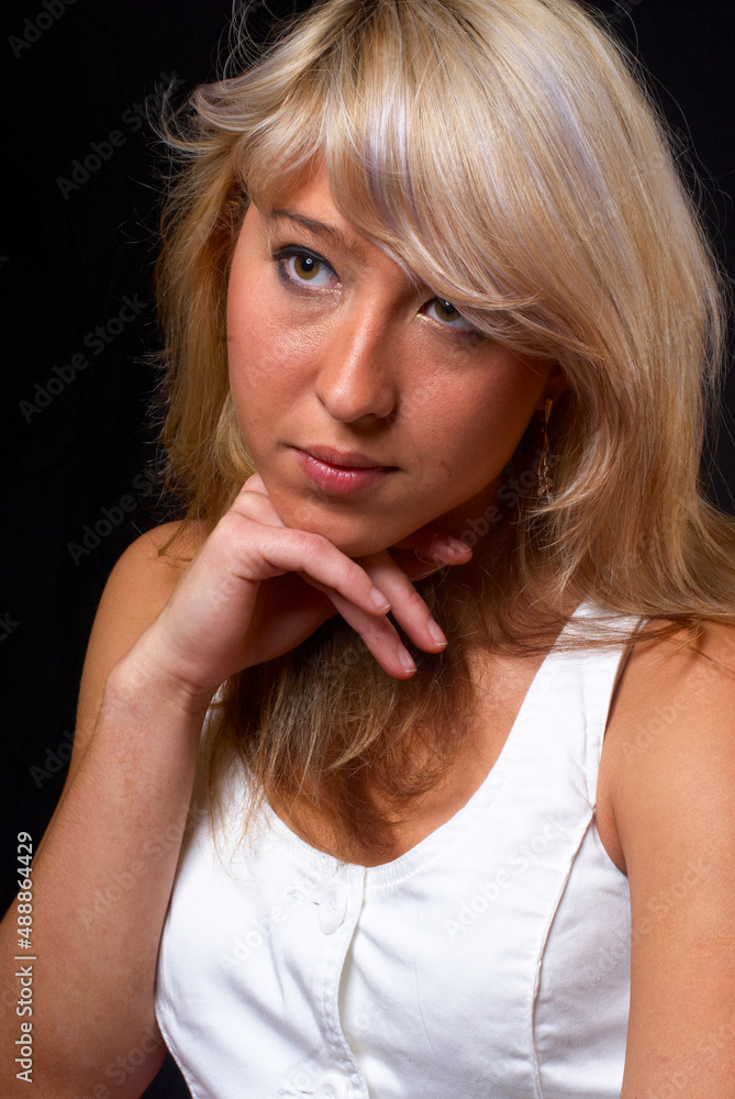 Young pretty woman over black background Young pretty woman over black background