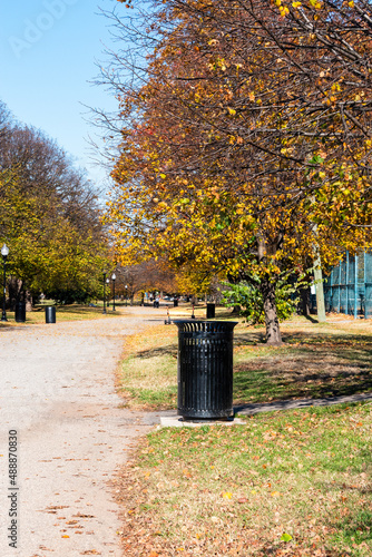 Trash Can in a beautiful public park.  © Christine