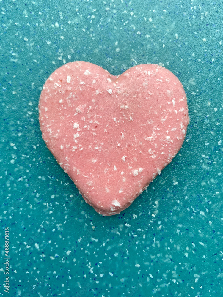 valentine shaped cookie with coconut shavings valentine shaped cookie with coconut shavings