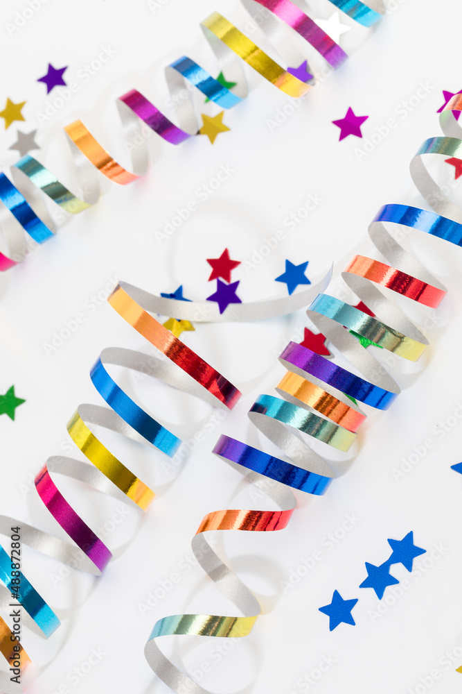 Obraz premium Colorful confetti on white background text place .