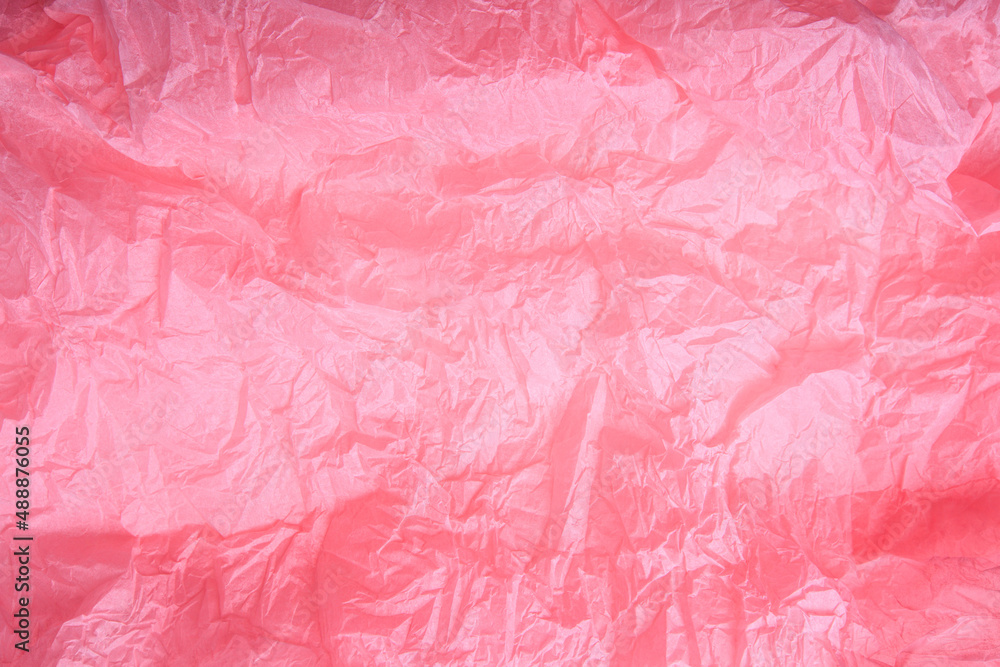 Fototapeta premium Crumpled recycle pink paper background - Pink paper crumpled texture - Image
